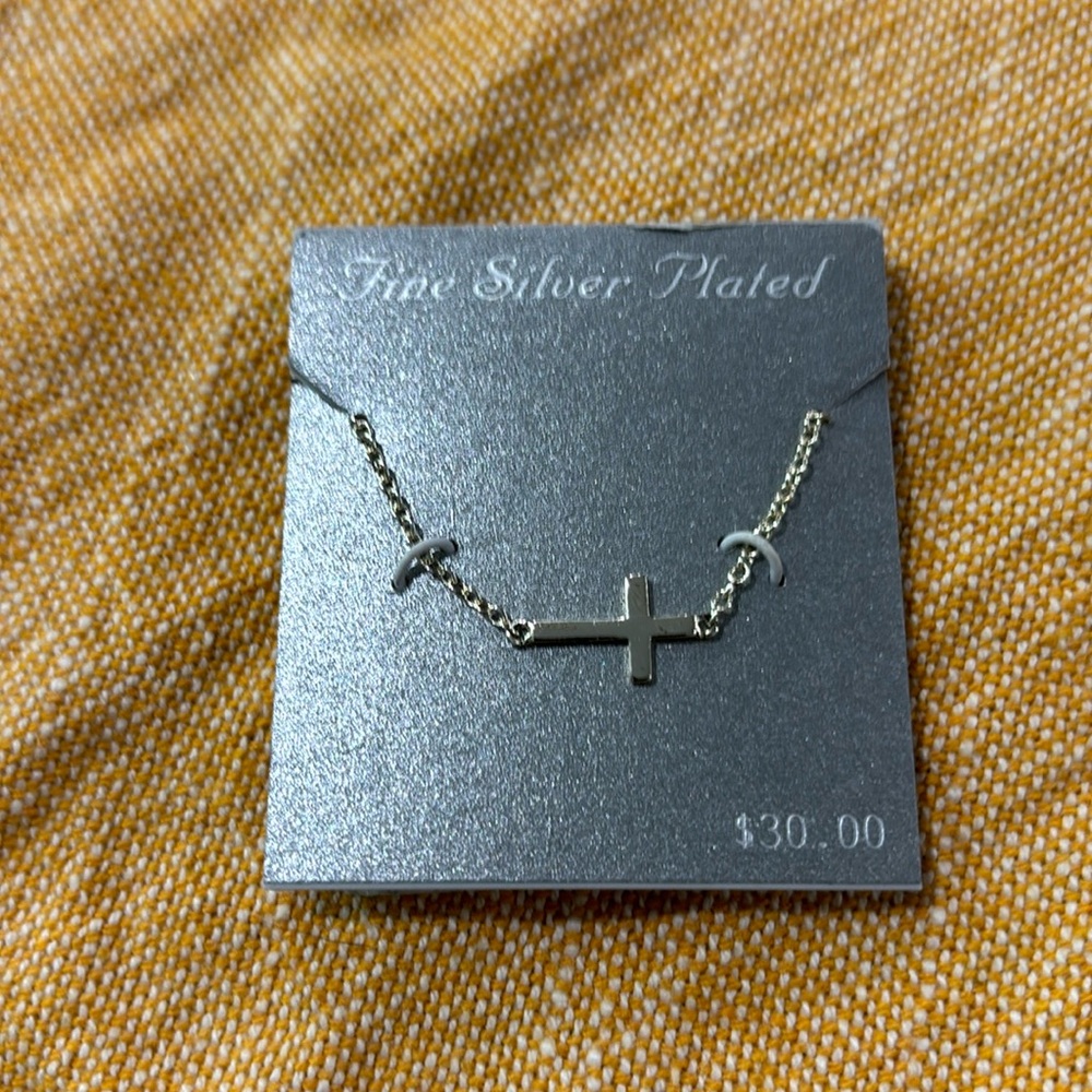 Brand new fine silver plated cross